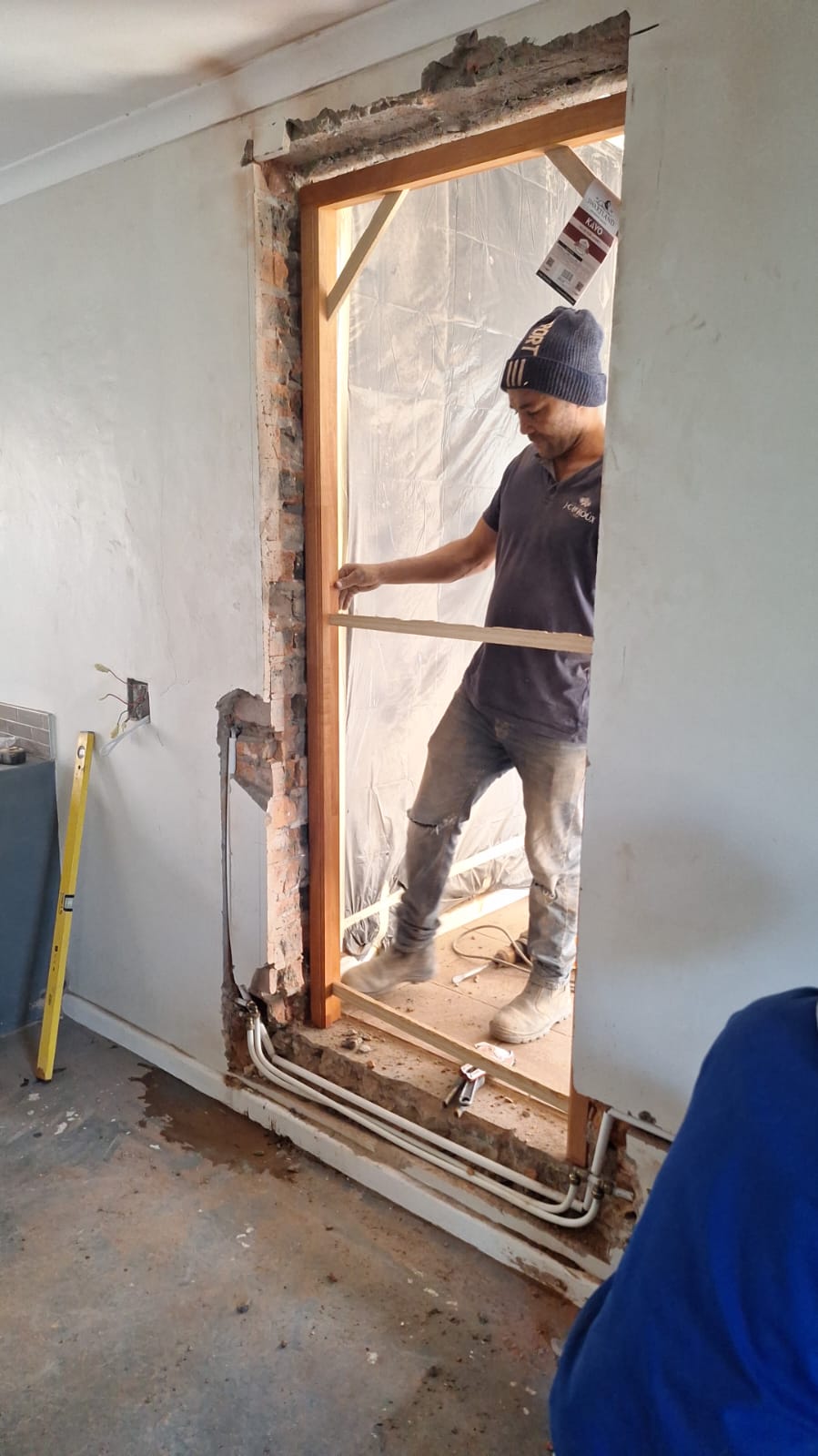 Fitting a new door frame on site